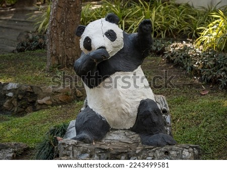 Statue of a panda doing a dab dance in Chiang Mai Zoo