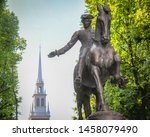 A statue of Paul Revere on horseback, near the Old North Church where lanterns were hung warning him of the incoming British by land or sea.