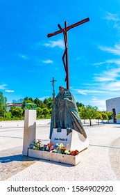 Statue Of Pope John Paul II And High Cross At Fatima, Portugal