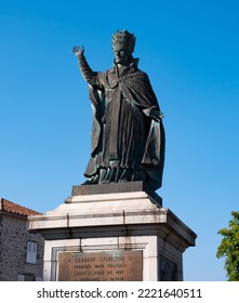 Statue Of Pope Sylvester II, Medieval Scholar And Clergyman In French City Of Aurillac On Sunny Summer Day