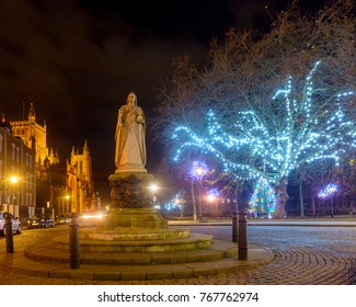 Statue Of Queen Victoria With Bristol Cathedral And Christmas Lights In The Background, Long Exposure Night Photography