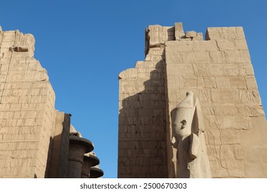 Statue of Ramesses II at the second pylon of Karnak Temple Complex, Luxor, Egypt