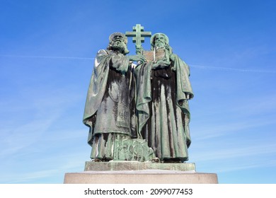 Statue of Saint Cyril and Methodius, Radhost, Czech Republic, Czechia - December 26, 2021: Monument of Christian missionaries. Figures hold book with cyrillic text: Holy Bible, John, 1:1-4.