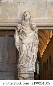 Statue of a saint at the entrance of the Abbey of Baume les Messieurs in the Jura in France - Shutterstock ID 2199251505