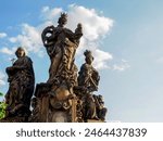 The statue of Saints Barbara, Margaret and Elizabeth are outdoor sculptures by Ferdinand Brokow, Jan Brokow and Michael Brokow, installed on the south side of Charles Bridge, Prague, Czech Republic