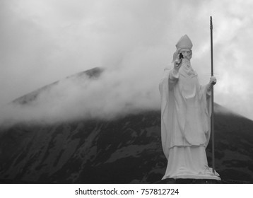 Statue Of St. Patrick And St. Patrick Hill In The Clouds In The Ireland