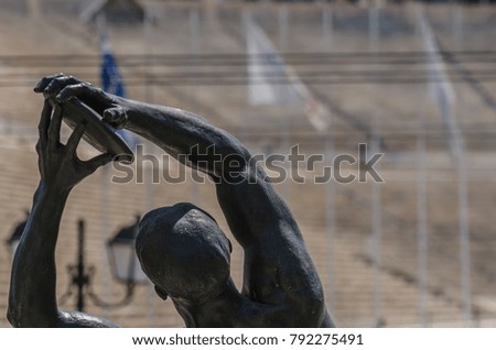 statue of stadium in athens detail view