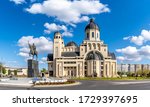 The statue of Stefan Cel Mare and  Cathedral in center of Bacau city, Moldavia landmark, Romania