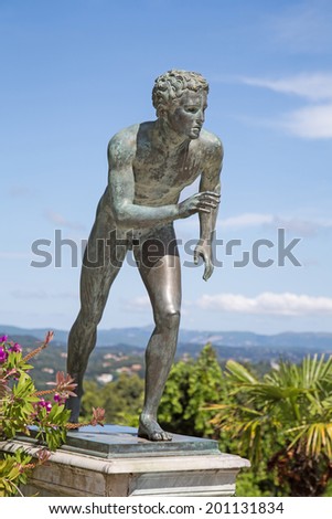 A statue of 'The Runner' in the garden of Achilleion in Corfu palace.
