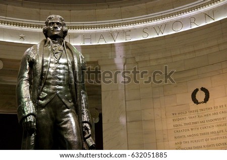 Statue of Thomas Jefferson and the Declaration of Independence inscription at the Jefferson Memorial, Washington DC