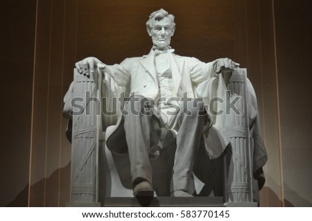 Statue of US President Abraham Lincoln inside the Lincoln Memorial at night, Washington D.C.