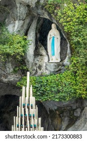 Statue of Virgin Mary in the grotto of Our Lady of Lourdes, France