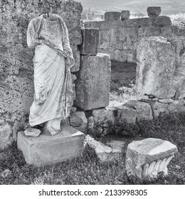 Statue without head at the ruins located at Corinth, Greece	