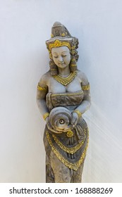 Statue Of A Woman. Thai Ancient Stone Carving