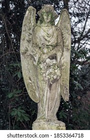 Statues Angel Headstone On Grave Old Cemetery