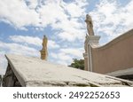 Statues by the Saint Josaphat church in the Kamianets-Podilskyi city, low-angle