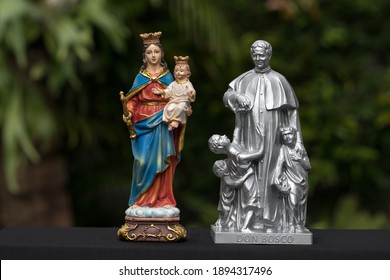 The Statues Of Don Bosco And Mary Help Of Christians.