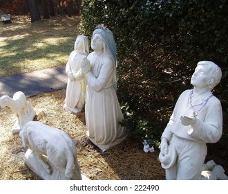 Statues Of The Fatima Children: Jacinta, Lucia, And Francisco.