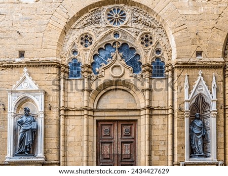 The statues in the niches of the Church Orsanmichele in via dei Calzaiuoli, built in the 14th century as a grain market and then converted into a church, Florence city center, Tuscany, Italy	