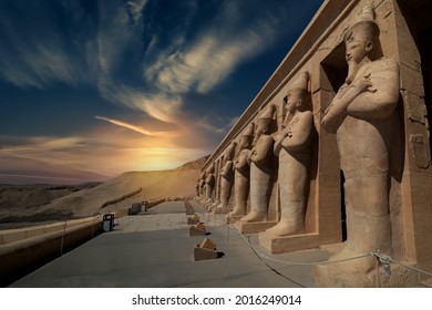 Statues Of Queen Hatshepsut As Osiris At Her Mortuary Temple In Luxor . Egypt.