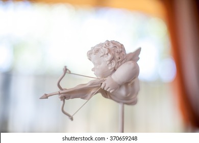 Statuette of Cupid in the wedding ceremony.