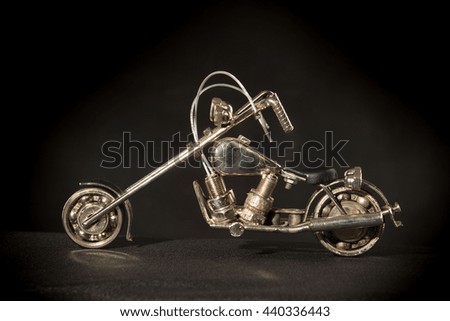 Statuette of a metal, a small model of the motorcycle