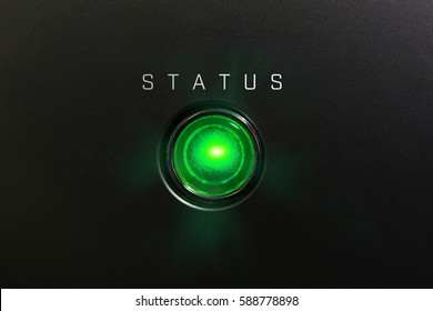 Status Indicator Or Lamp. Green Glowing Warning Lamp Or Button Black Panel With The Words, 