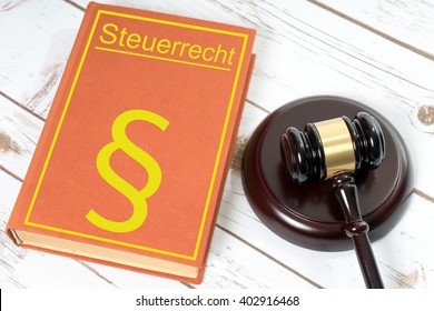 Statute Book With The German Words Tax Law And Judges Gavel / Statute Book