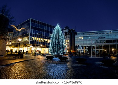 Stavanger, Norway, December 2017: Christmas Tree In Stavanger City Centre Next To Cathedral At Night