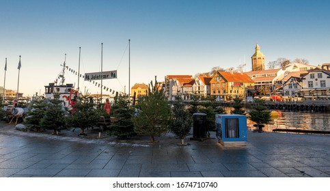 Stavanger, Norway, December 2017: Christmas Tree Sale In A Small Seasonal Market In A City Centre Harbor