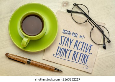stay active, do not retire - ikigai rule, inspirational handwriting on napkin with coffee, aging and healthy lifestyle concept