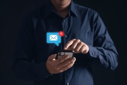 Stay Connected With E-mail Notifications! A Man Checks His Inbox On His Phone, Keeping Up With Work And Life On-the-go. Modern Technology At Its Finest.