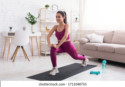 Stay Home, Stay Active. Hispanic Girl Doing Cardio Workout In Living Room