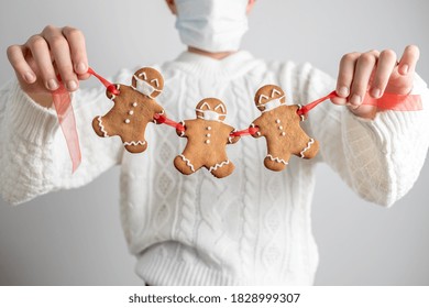 Stay Home Quarantine From Covid-19. Christmas Gingerbread Men With A Masks