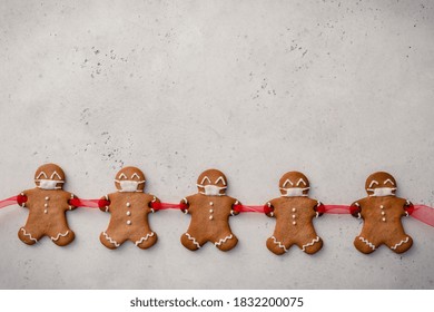 Stay Home Quarantine From Covid-19. Christmas Gingerbread Men With A Masks