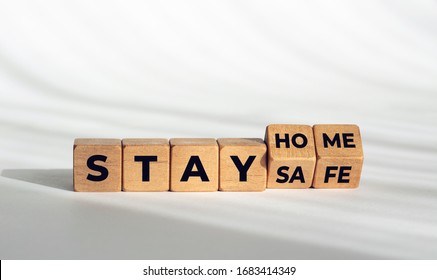 Stay At Home Stay Safe Message On Wooden  Blocks. Coronavirus COVID-19 Outbreak Advice