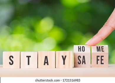 Stay at home stay safe message on wooden cubes. Coronavirus COVID-19 outbreak. - Shutterstock ID 1721516983