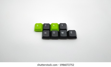 Stay home sign word  made and two color keyboard keycaps  white  grey gradient background