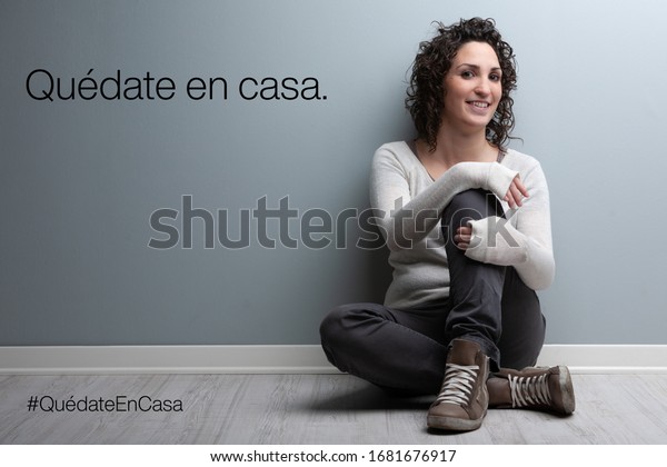 stay-home-text-spanish-woman-sitting-stock-photo-edit-now-1681676917