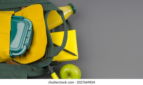 Stay Safe. Lunch Box, School And Office Supplies On A Dark Background. Back To School Concept. Social Distance, Learning And Home Education. Top View. Copy Space.