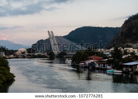 stayed bridge over Marapendi Lagoon during sunrise on cloudy morning, Barra da Tijuca, Rio de Janeiro.
