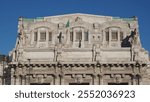 Stazione Centrale Central railway station (text Nell anno MCMXXXI dell era di Cristo means Year 1931 AD) in Milan, Italy