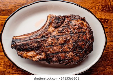 Steak. Grass-fed skirt steak, grilled to a medium rare and served with a garlic herb butter sauce and paired with roasted potatoes and Brussels sprouts. Classic American steakhouse favorite. - Powered by Shutterstock