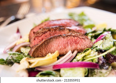 Steak and Greens Salad with Grass Fed Beef and Red Onions