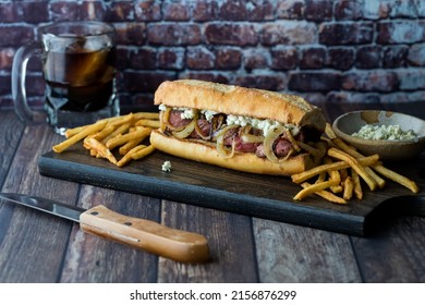 A Steak Hoagie Bun Served With Fries And Cola, Against A Rustic Background