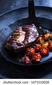 Entrecôte, Steak In An Iron Pan With  Tomatoes