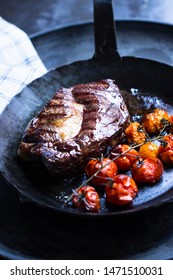 Entrecôte, Steak In An Iron Pan With  Tomatoes