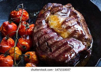 Entrecôte, Steak In An Iron Pan With  Tomatoes