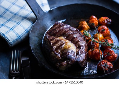 Entrecôte, Steak In An Iron Pan With  Tomatoes