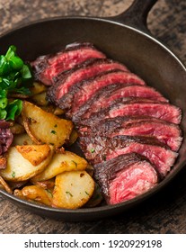 Steak And Potatoes. Grade A Grass Fed Angus Beef Steaks. Tenderloin, Filet Mignon, New York Strip, Bone In Rib-eye Grilled Medium Rare On Outdoor Wood-fired Grill. Classic American Steakhouse Entree.